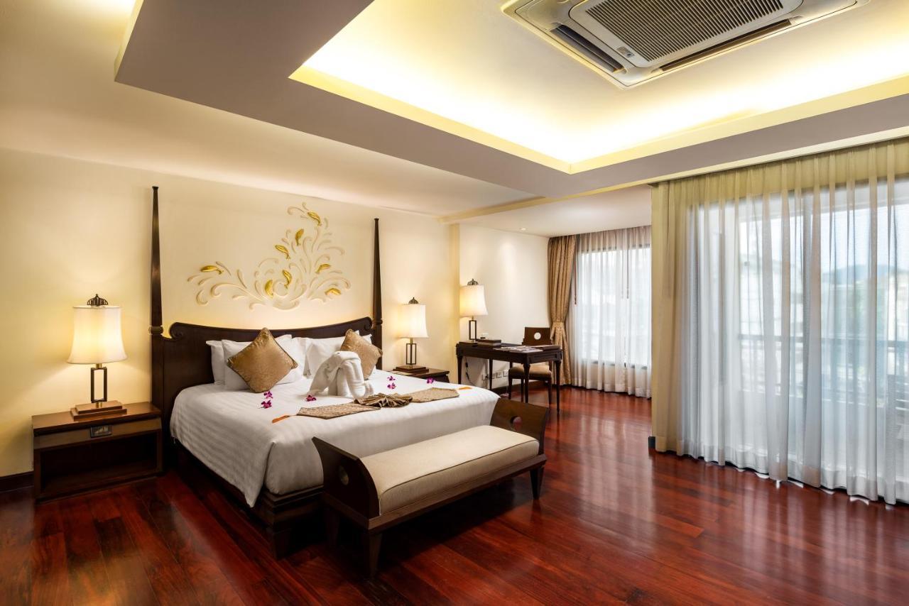 Patong Paragon Resort & Spa Sha Extra Plus Dış mekan fotoğraf A bedroom at the hotel